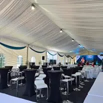 Canopy cocktail tables with bar stools