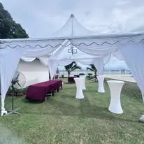White cocktail table covers under canopy