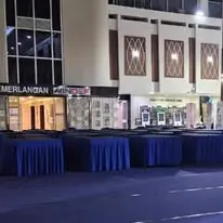 Night display table setup with blue skirting